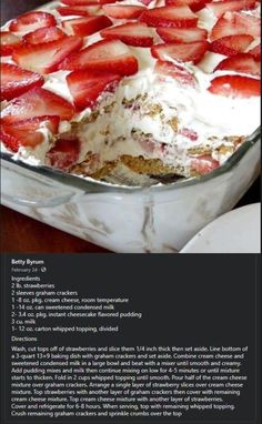 a cake with strawberries on top in a glass dish