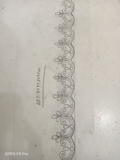 an old pattern is on the paper with some type of design in it's corner