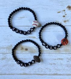 Perfect gift for your little sports fan! This listing is for one (1) bracelet.  Beads are matte black and are 4mm. Bracelet sizing chart is just a general guide.  Since wrist size varies greatly from person to person, please measure your wrist and add half (.5) an inch to get the best fit. ✨Jewelry Care✨ 💜 Avoid contact with water, perfumes, lotions and chemicals 💙 Roll bracelet on and off wrist to avoid overstretching. 💛 Do not drop your bracelets on hard surfaces. 💚 Store in a cool, dry pl