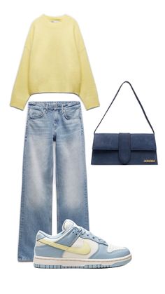 a yellow sweater and jeans outfit