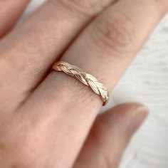 Elegant, daily wear, and stacking-friendly braided band ring made in 14K solid gold. Made to Order. Ships within 3-4 weeks. - Band width: 3.2mm - Finish: Yellow, Rose, or White - Made in 14 karat gold.- Stamp with 14K. Wedding Band Braided, Gold Braided Ring, Braided Wedding Ring, Braided Rings, Braid Rings, Woven Wedding Band, Elegant Wedding Bands, Rings Combination, Plain Gold Wedding Band Woman