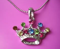 "crown pendant necklace. Vintage. Colourful glass rhinestones with silver-plated metal chain. Crown approx. 1 \" x  2,5 cm Necklace approx. 15,5 \" / 40 cm long" Multicolor Jeweled Rhinestone Necklace For Gift, Multicolor Jeweled Rhinestone Necklace Gift, Chain Crown, 2000s Accessories, Crown Pendant Necklace, Crown Pendant, Pendant Necklace Vintage, Y2k Necklace, Crown Necklace