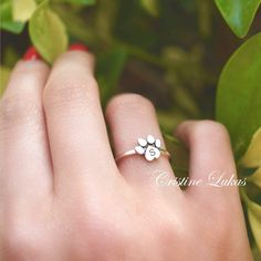 This dainty Paw Print ring is a symbolic way to show off your love for your beloved pet. Ring can be worn separately or stacked with other rings. Beautiful modern look for women of any age who have a special connection with their pet.  Metal:  Sterling Silver Sterling Silver with Yellow Gold Overlay Sterling Silver with Rose Gold Overlay Paw size: 7mm Sizes: 4 to 11 ------------PRODUCTION------------- Allow 3-5 Business Days for production Paw Print Ring, Dog Paw Print, Baby Animals Funny, Zierlicher Ring, Initial Ring, Dog Paws, Stackable Rings, Paw Print, Or Rose