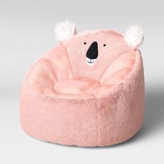 a pink chair with a koala bear on it