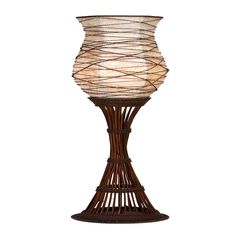 a lamp that is made out of wicker and has a white light on top