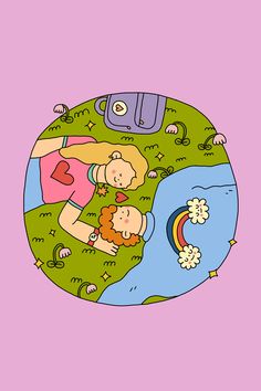 two people laying on top of a lush green field next to a rainbow in the sky