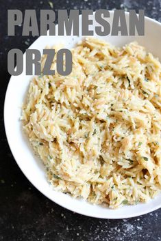 parmesan orzo rice in a white bowl on a black table with text overlay