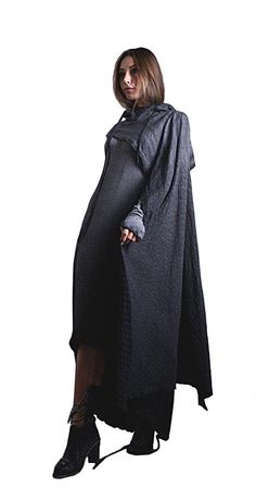 Medieval, Gothic dress Long sleeve hand mitt winter cloak /DressThis brand new Hooded dress design from my resident in house designer Junus, is an imposing, Pagan clothing style,  edgy winter medieval gothic. Made from super soft and thick 2 ply cotton it definitely a unique and unusual look.Winter cloak with hooded scarf, Encompassing pockets, hand mitts and scarf all attached and can be worn in many different styles, there is a tie up hemline at the asymmetrical back.  hooded cloak or viking t Woman In Hooded Cloak, Gothic Dress Long, Black Hooded Larp Costume, Gothic Hooded Dress, Cloaks Hooded Medieval, Gothic Hooded Cape For Larp, Open Back Black Dress, Cloak Dress, Winter Cloak