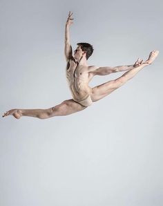 a male ballet dancer in the air