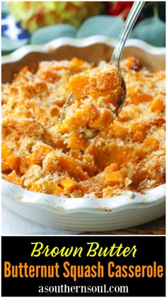 brown butter butternut squash casserole in a white dish with a serving spoon