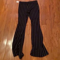 Juniors Stripe Flowy Pants Size: Medium Color: Black And White Brand: Raggs 2 Riches New With Tags Perfect Condition No Holes Or Stains Smoke Free Home Wb2 Striped Fitted Pants For Night Out, Striped Stretch Bottoms For Night Out, Striped Wide Leg Pants For Night Out, Striped Stretch Flare Pants, Stretch Flare Striped Pants, Casual Striped Flare Bottoms, Casual Flared Striped Bottoms, Trendy Fitted Striped Bottoms, Trendy Striped Fitted Pants