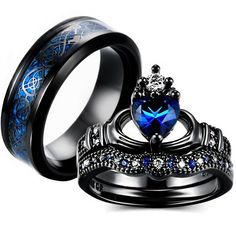 two black rings with blue and white diamonds in them, one has a crown on it