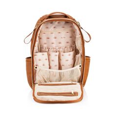 Itzy Ritzy Your forever bag for baby & beyond, every (little) step along the way! The Boss Plus Backpack is everything you love in our original Boss Backpack with a sleek design and premium features. Elevated with thoughtful organization and style, this bag is perf to take on your new babe’s journey – from all packed up to welcome baby at the hospital to adventurous playdates to an amazing work, pumping or me-time bag for you. • 19 total pockets (6 external and 13 internal) • Includes coordinati Dipper Bag, Rubber Bags, Stylish Diaper Bag, Backpack Diaper Bag, Itzy Ritzy, Stroller Straps, At The Hospital, Diaper Changing Pad, Baby Diaper Bags