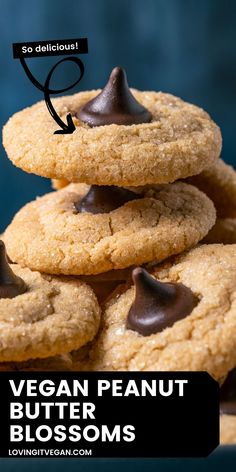 vegan peanut butter blossom cookies stacked on top of each other with text overlay