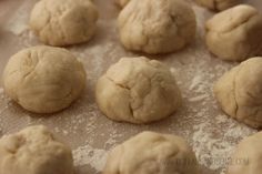 doughnuts are on a baking sheet ready to be baked