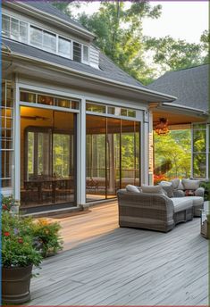 an outdoor living area with patio furniture and large sliding glass doors