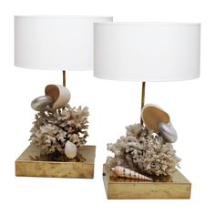 two lamps with shells and seashells on them