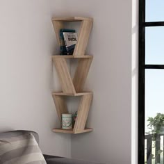 a corner shelf with books and magazines on it