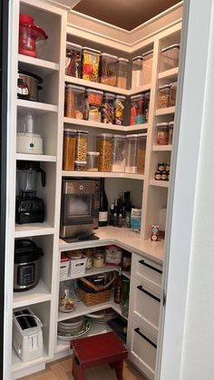 an open pantry with lots of food in it