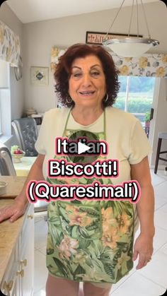 a woman standing in front of a kitchen counter with the words i am biscotti quaresimal