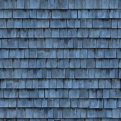 an image of a blue roof that looks like wood shingles