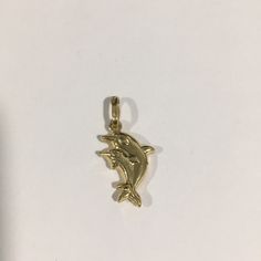 Beautiful 14k Yellow Gold Dolphin Charm. Weight: 0.9g. Length: 0.90" With Bail. Width: 0.40". New Without Tags!! Percy Jackson, Dolphins, Womens Jewelry Bracelets, Yellow Gold, Women Jewelry, Yellow, Gold, Women Shopping, Color