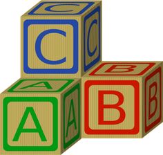 three blocks with the letters abc and c on them, all stacked up in different colors