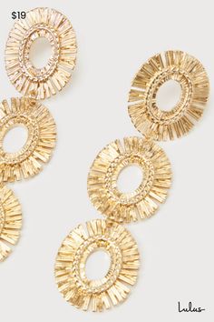 You'll shine brightly on every occasion when you pair the Lulus Burst of Brilliance Gold Drop Earrings with your evening ensembles! This trio of gold-toned oval-shaped sunburst-inspired charms are linked together to form a shoulder-dusting silhouette. Post Backs. 3. 5" Long And 1" Wide. Man Made Materials. Imported. Lulus | Burst of Brilliance Gold Drop Earrings. Statement Gold Earrings, Gala Gowns, Lulu Fashion, Gold Statement Earrings, Statement Drop Earrings, Birthday Wishlist, Accessories Jewelry Earrings, Gold Drop Earrings, Party Accessories