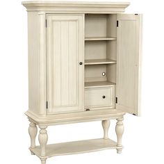 a white armoire with drawers and shelves