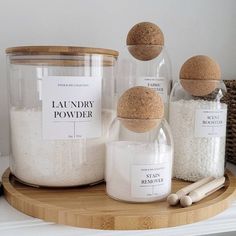 Tired of looking at plastic boxes and bottles in your utility room? This set is your perfect storage solution! The Cork Ball Jars are great for your Fabric Conditioner, Scent Boosters, Soda Crystals or Stain Remover, whereas the Wide Mouth Jars are perfect to store your Laundry Pods or Laundry Powder. To complete your set, make sure you also choose our Large Round Bamboo Tray. It's just the perfect finishing touch! You can choose between 2 sets: Laundry Room Jars, Cork Ball, Pantry Jars, Glass Pantry, Laundry Powder, Laundry Room Wallpaper, Laundry Pods, House Organisation, Scent Booster