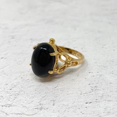 Gorgeous vintage cocktail ring!  18 K gold electroplated with a black onyx stone Circa 1990s New old stock  Never worn  Excellent vintage condition. Please enjoy!  Thanks for visiting ♥ Cocktail Vintage, Vintage Cocktail Ring, Fancy Jewellery Designs, Black Onyx Stone, Fancy Jewellery, Vintage Cocktail, Onyx Stone, Jewellery Designs, Cocktail Ring