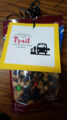 there is a bag of trail mix on the table