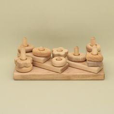 a wooden toy set sitting on top of a table