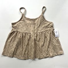 Nwt. Soft Knit Tank Top. Round Neck With Henley Button Placket. Spaghetti Straps. Shirring At Peplum Waist. Tan With Blue Stars. Perfect For Summer Or 4th Of July. Gap Medium (8). Casual Beige Tops For Playwear, Beige Cotton Tops For Playtime, Summer Buttoned Tops By Gap, Spring Gap Tops With Buttons, Spring Buttoned Tops From Gap, Beige Tops For Summer Playwear, Beige Cotton Tops For Playwear, Cute Sleeveless Buttoned Tops, Gap Summer Tops With Button Closure