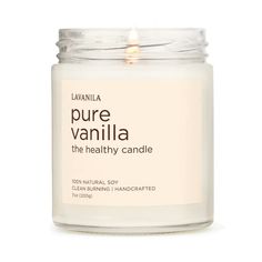 a white candle with the words pure vanilla in front of it on a white background