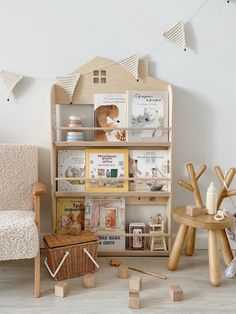 a child's room with wooden toys and bookshelves