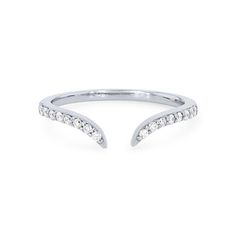 an open white gold ring with diamonds on the side, set in 18k white gold