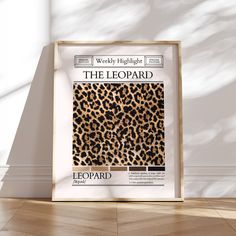 the leopard print is displayed in front of a white wall