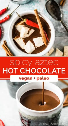 hot chocolate in a white cup with cinnamon sticks sticking out of it and the words spicy azec hot chocolate vegan pale on top