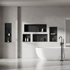 a large white bath tub sitting in a bathroom