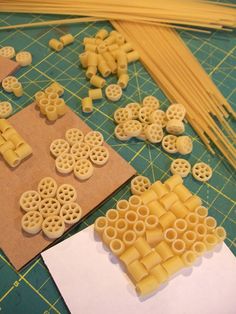 the pasta is cut up and ready to be put into small pieces on the cutting board