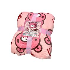 a pink teddy bear blanket with hello kitty on it's back and the tag