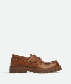 "Find BOTTEGA VENETA Haddock Boat Shoe on Editorialist. Weathered leather boat shoe. Lining: Calfskin. Color: Light Wood. Rubber outsole. Flatform: 4.5 cm | 1.8\". Calfskin." Leather Boat Shoes, Boat Shoe, Leather Denim, Eyewear Womens, Boots And Sneakers, Leather Dresses, Pumps Flat, Light Wood, Mini Crossbody