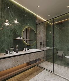 a bathroom with a large mirror and two sinks