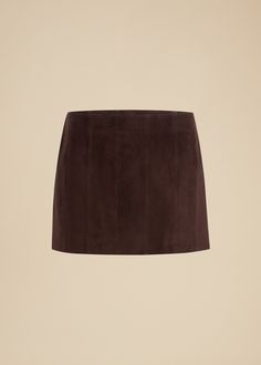 Description A paneled miniskirt in full-grain suede lined in silky cupro twill. Finished with concealed zipper closure at side. Details Material: Full-grain suede (100% lambskin) Care: Dry clean Fit: True to size. Recommended to take your normal size. Model is 5'10," wearing size 2. Brown Suede Skirt, Brown Leather Skirt, Leather Outerwear, Suiting Fabric, Suede Mini Skirt, Suede Skirt, Dark Brown Leather, Outerwear Coats, Denim Pant