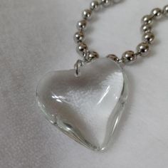 White Transparent Glass Heart Necklace Chunky Chain White Heart Necklace With Chain, Trendy White Glass Necklaces, Trendy Clear Glass Jewelry, Trendy White Glass Necklace, Clear Glass Heart Pendant Necklace, Clear Heart Charm Necklace, Clear Heart Charm Necklace With Heart Pendant, Trendy Clear Jewelry With Chain, Trendy Clear Metal Jewelry