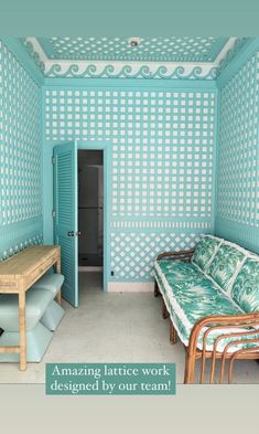 a bedroom with blue walls and green furniture