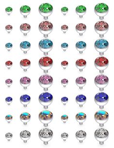 an assortment of different colored jeweled knobs