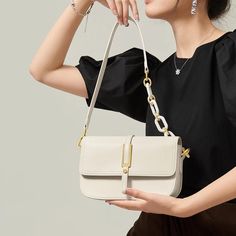 Discover Elegance and Versatility Step into the season with sophistication using our exclusive White Leather Crossbody & Shoulder Bag. Designed for the fashion-forward woman, this bag embodies elegance and versatility, perfectly complementing your spring and summer wardrobe. Whether you're attending a daytime event or an evening soiree, this bag seamlessly adapts to all occasions, ensuring you always step out in style. Premium Quality and Design Crafted with genuine cow leather, this bag boasts a soft, luxurious texture that's both durable and stylish. The saddle shape design, combined with a solid pattern and a flap pocket exterior, offers a classic yet contemporary look. Its multiple interior compartments, including a slot pocket, zipper pocket, and a spacious main compartment, provide a Elegant Satchel Shoulder Bag For Travel, Elegant Leather Bags For Spring, Elegant Beige Evening Bag For Spring, Chic Baguette Clutch Bag For Travel, Luxury Spring Satchel Shoulder Bag, Elegant Leather Satchel For Spring, Luxury Spring Shoulder Satchel, Chic Clutch Baguette Bag With Detachable Strap, Elegant Satchel Shoulder Bag With Adjustable Strap