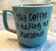 a coffee cup with writing on it that says, this coffee is making me awesome